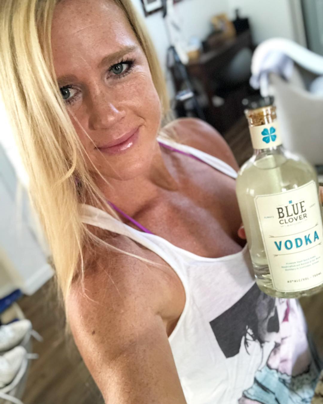 Holly Holm IG Post - Come say hi and try some @bluecloverdistillery vodka! I’ll be hanging out at Total Wine and More...